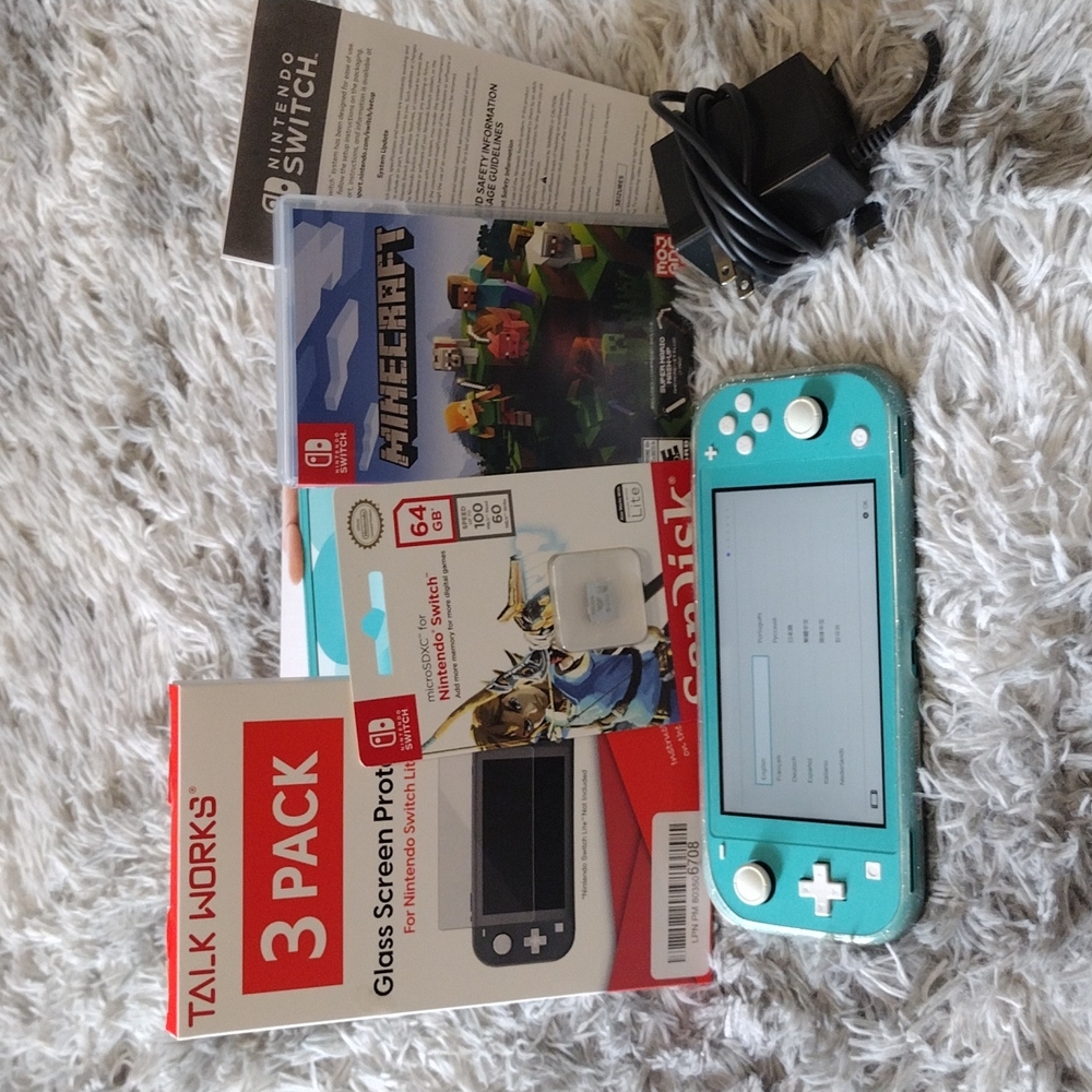 Turquoise Nintendo switch lite console bundle